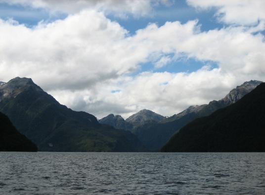 NOW the sun comes out! The boat ride back across Lake Manapouri.